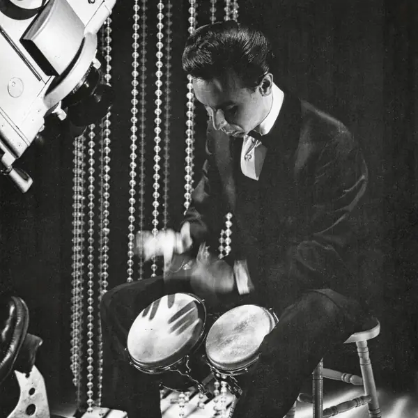 Dean Barlow with bongos, CBS headshot, 1960